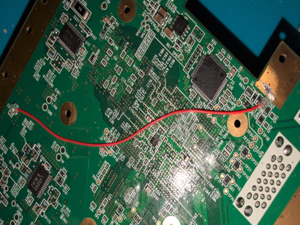 A photograph showcasing the installation of the 5vdc fan mod for early six layer Wii motherboards.